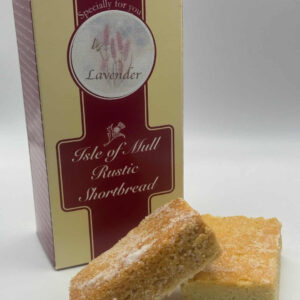 box of tobermory stores handmade lavender shortbread with two delicious pieces of tobermory stores lavender handmade shortbread in the foreground